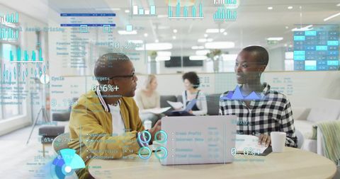 Diverse professionals discussing financial data in modern office