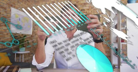 Man interacting with holographic data dashboard and turquoise charts in modern home office