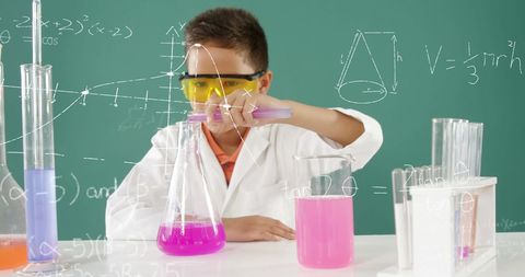 Young Scientist Conducting Experiment with Test Tubes in Chemistry Class - Download Free Stock Images Pikwizard.com