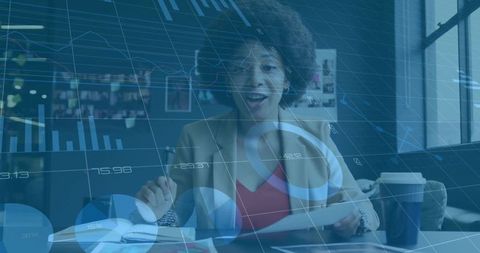 Businesswoman analyzing data with modern digital interface