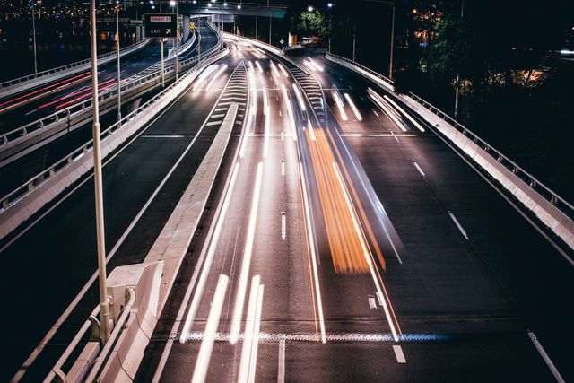 High-Speed Traffic Flow on Urban Highway at Night - Download Free Stock Photos Pikwizard.com