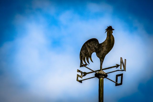 Rooster-Shaped Weather Vane Against Clear Blue Sky - Download Free Stock Images Pikwizard.com