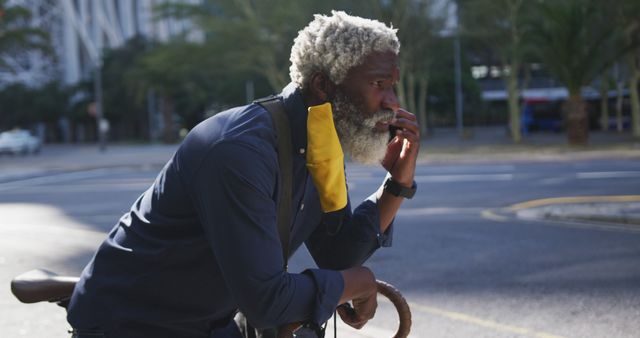 Older Man Taking Break from City Bicycle Ride Holding Chin - Download Free Stock Images Pikwizard.com