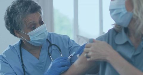 Nurse Administering Vaccine in Medical Clinic