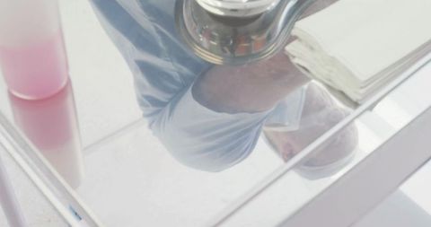 Mirror reflection capturing photographer with dslr camera