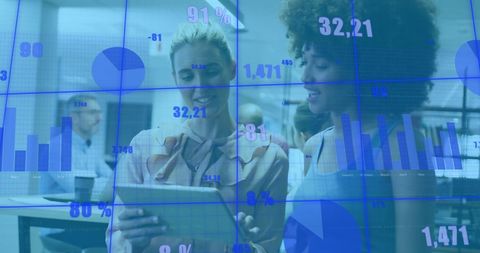 Diverse Businesswomen Analyzing Growth Charts in Futuristic Office