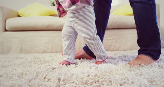 Baby Learning to Walk with Parent in Cozy Living Room - Download Free Stock Images Pikwizard.com