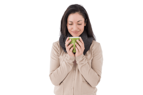 Smiling Woman Enjoying a Warm Beverage with Transparent Background