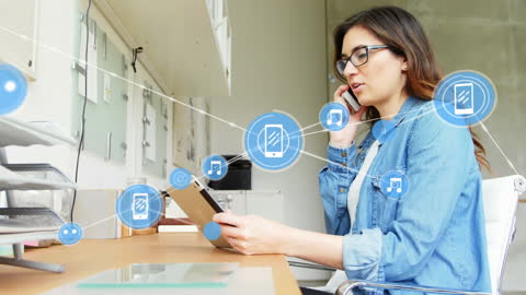 Modern Businesswoman Using Tablet and Smartphone for Networking