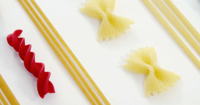 Assorted Uncooked Pasta Varieties on White Background - Download Free Stock Images Pikwizard.com