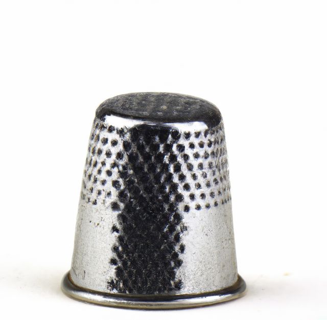 Image of close up of silver thimble and copy space on white background - Download Free Stock Photos Pikwizard.com