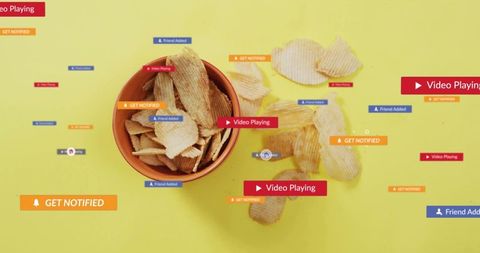 Ridged chips surrounded by digital alert pop-ups on yellow surface