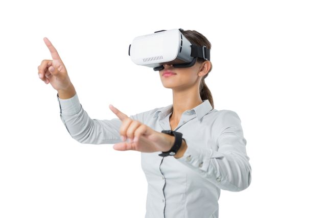 Businesswoman wearing a virtual reality headset and interacting with virtual objects. Ideal for use in technology-related content, business innovation articles, and modern workplace concepts. Represents tech-savvy professionals and the integration of VR in business settings.