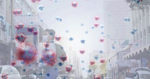 Masked woman on street with floating covid-19 cells overlay