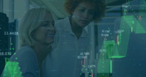 two women analyzing digital stock data in modern office - Download Free Stock Images Pikwizard.com