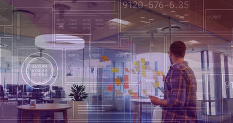 Businessman Analyzing Complex Data in Modern Office