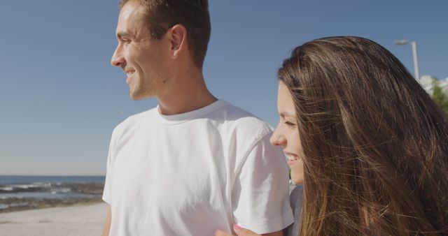 Smiling Couple Enjoying Seaside, Relaxing Beach Walk - Download Free Stock Images Pikwizard.com