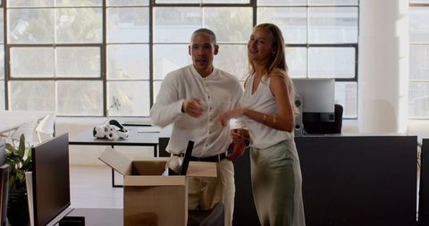 Young professionals collaborating in modern workplace environment