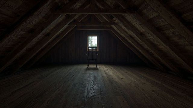 Solitary Rocking Chair Below Attic Window in Vintage Setting