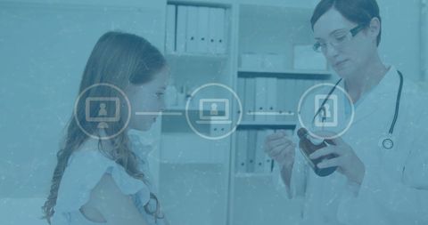 Doctor Demonstrating Medicine to Young Patient with Digital Data Overlay