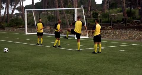 Soccer Team Warm-Up and Strategy Preparation on Field