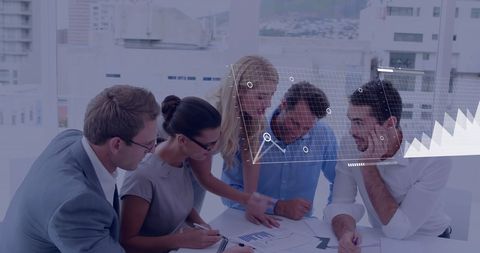 Diverse Business Team Analyzing Digital Financial Data Displays