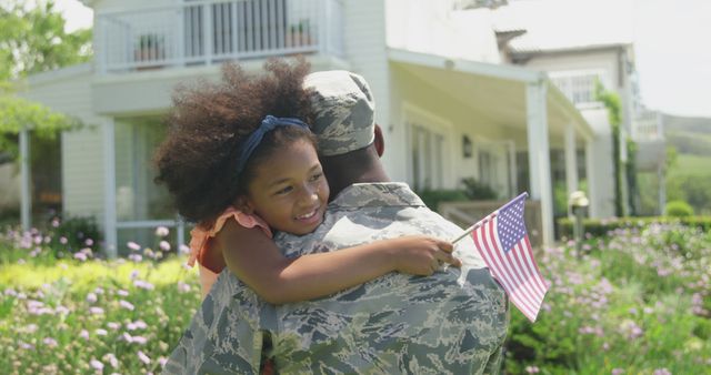 African American Soldier Embracing Daughter Holding American Flag Outdoors - Download Free Stock Images Pikwizard.com