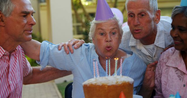 Senior Friends Celebrating a Joyful Birthday - Download Free Stock Images Pikwizard.com