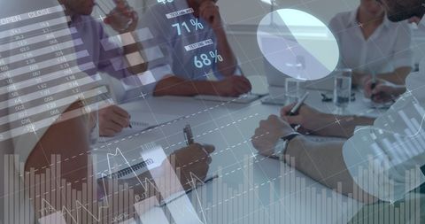 Business Team Analyzing Data with Financial Graphs Overlay
