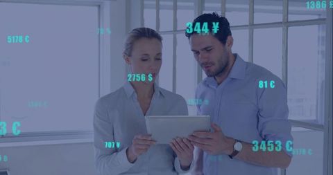 Business Professionals Analyzing Finances via Digital Tablet in Modern Office