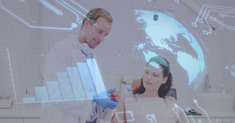 Doctor demonstrating heart model with digital overlay to patient