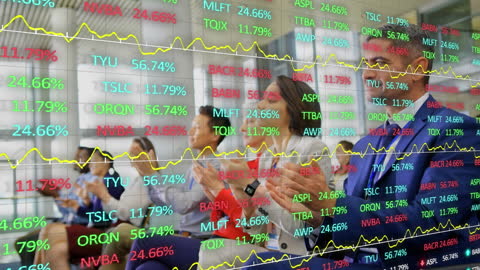 Diverse Business Team Applauding Market Success with Financial Data Overlay