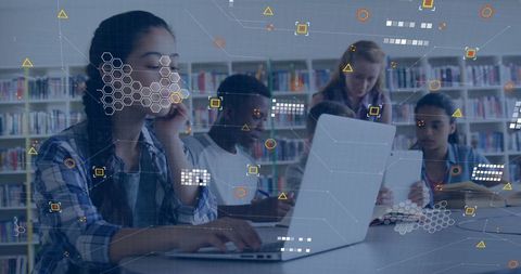 Students Collaborating with Technology in Library