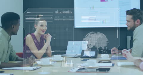 Colleagues Discussing with Data Visualizations in Modern Office