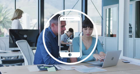 Team Collaborating Over Laptop with Technology Icon Overlay