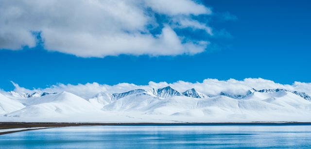 Serene Snow-Capped Mountain Range Reflected in Calm Blue Lake - Download Free Stock Photos Pikwizard.com