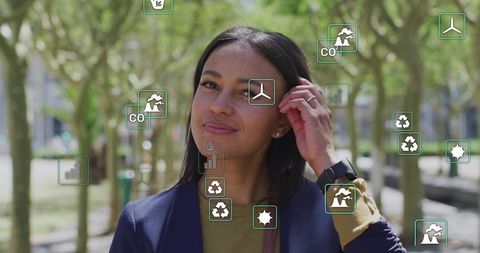 Professional adjusting hair on urban walkway with sustainability icons and wind energy symbols