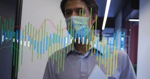 Working Professional Analyzing Data in Modern Office Environment