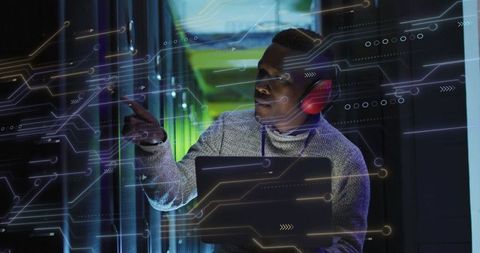 IT Technician Analyzing Data in Modern Server Room - Download Free Stock Images Pikwizard.com