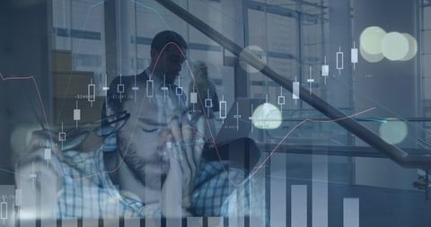Tired businessman with financial graph overlay