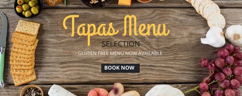 Rustic Tapas Menu Display with Snacks and Fresh Produce