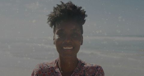 Woman Standing by Exchange Waves on Beach under Clear Sky