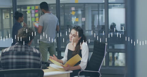 Office Team Discussing with Animated Data Overlay