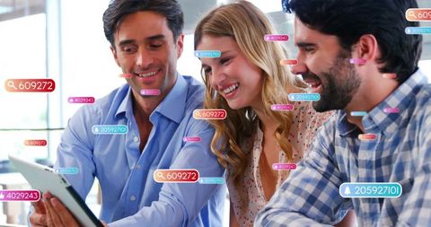 Collaborative team analyzing digital analytics on tablet