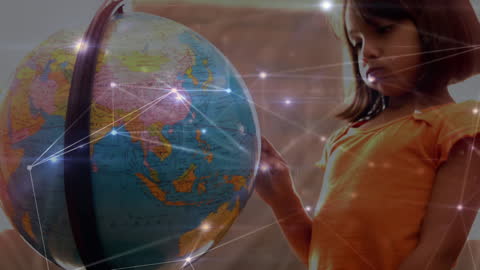Child Exploring Globe with Digital Connections and Education Concepts