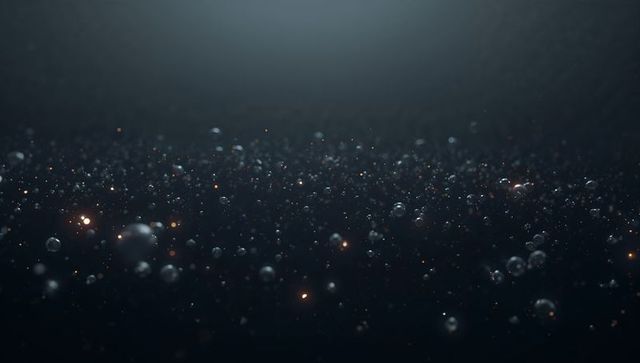 Floating glass orbs and warm glowing particles under soft top light creating deep bokeh