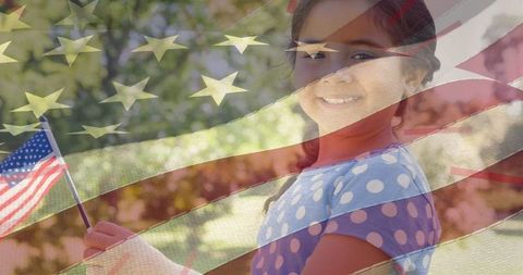 Young girl celebrating american patriotism with usa flag