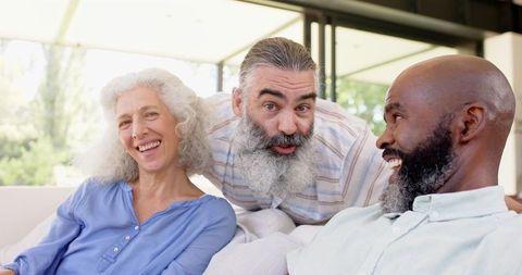 Senior Friends Enjoying Laughter and Bonding Outdoors