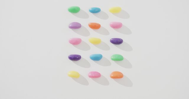 Colorful Jelly Beans Arranged in Neat Rows on White Background - Download Free Stock Images Pikwizard.com