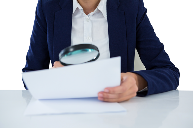 Businesswoman Reviewing Document with Magnifying Glass on Transparent Background - Download Free Stock Videos Pikwizard.com